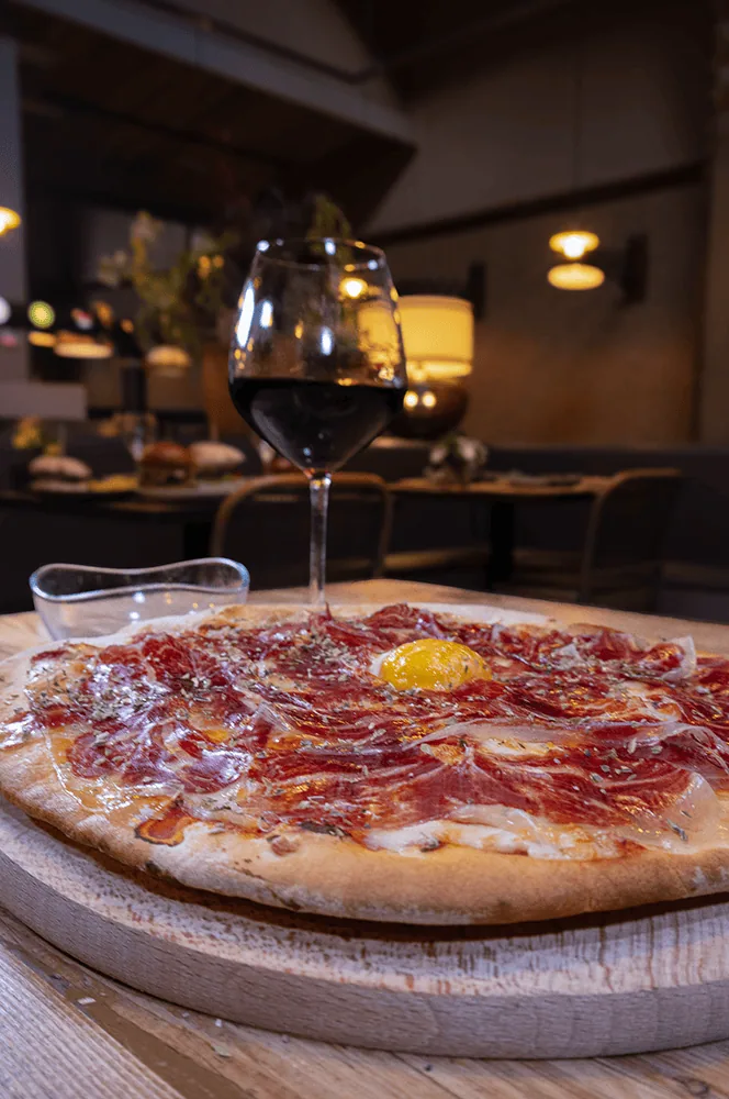 Iberian ham pizza with egg
